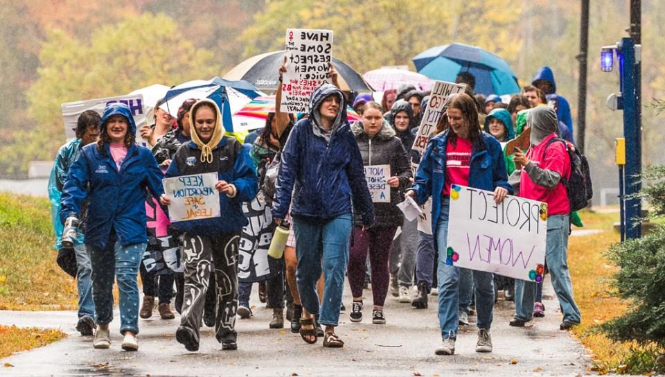 A group of U N E students at a Women's March